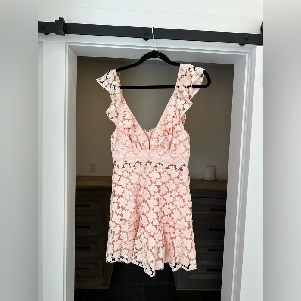 Feminine light pink dress with lace floral design. Worn twice, great condition!
